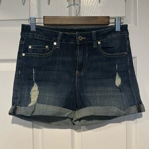 Distressed denim shorts